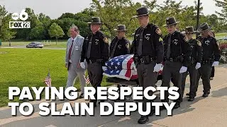 Mourners pay respects for slain Ohio deputy as judge sets bond at $5 million for suspected shooter