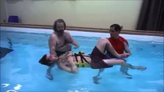 Seth doing physical therapy at Beyond Aquatics after incomplete spinal cord injury