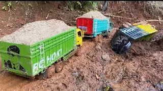 Jalan PENDAKIAN truk 4x4 Mitsubishi CANTER hdx muatan pasir menuju desa di gunung