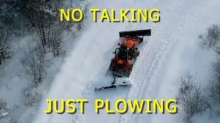 Snowplowing with the Kioti CX2510 HST.