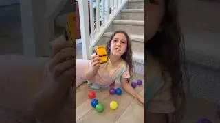 Sierra teaches Rhia Always put your  toys where they belong