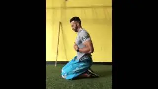Sitting back on heels with a quadriceps lift