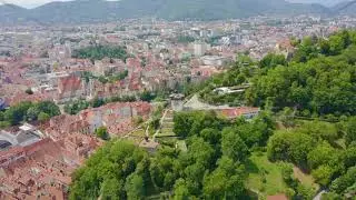 Graz, Austria. Clock Tower in Graz. The historic city center aerial view. Mount Schlossberg (Castle