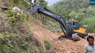 Excavator Cutting Loose Gravelly Hill Making Road Wider for Mountain Villagers