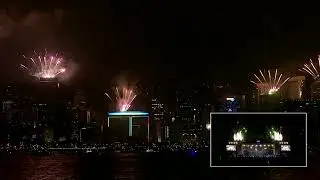 New Years 2022 Hong Kong skyline lights up with fireworks.