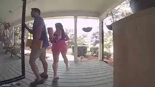 Woman Uses Umbrella to Scare Off Vulture in Home