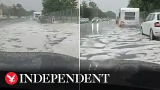 Ice covers road in Germany as extreme weather hits country