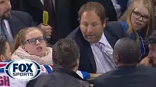 These fans fight over a hockey stick