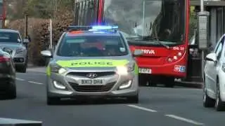 Police cars on emergency calls in High Barnet 15th March 2014