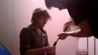 Matt opens a wine bottle with a screw and pliers