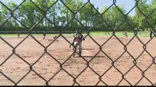 Youth baseball tournaments begin first games during COVID-19