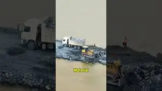 Warum kippen diese Lkw tonnenweise Steine ins Meer?