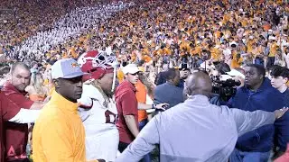 Alabama players leave field as Tennessee fans sing Dixieland Delight, rush field & rip down goalpost