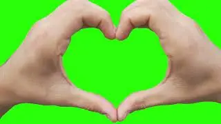 Hands making a heart shape on green screen 4k footage