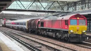 DB Class 66192 and 66185 drag Southeastern Class 465045 through Ashford International for storage 