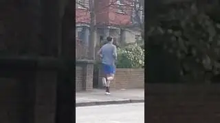 Jogger Going Slow Maybury Road Edinburgh Scotland UK