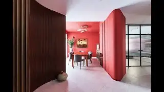 House Tour: A curvilinear condo with red dining room and plenty of storage