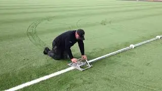 How to cut circles in an artificial grass football pitch