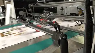 NSE-1200 Automatic Thin and Thick Paper UV Oil Coating Machine Testing before shipping to Thialand