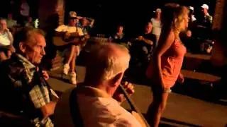 Linda and JD leading the bluegrass circle at the Guitar Army on 10/6/11