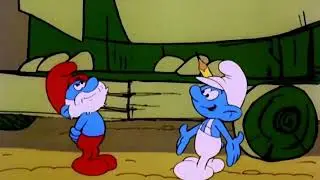 Smurfs - Brave Hefty vs. Dragon Fire! | WildBrain Thrill Park