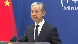 China says AUKUS alliance on 'path of error and danger' with submarine pact | AFP