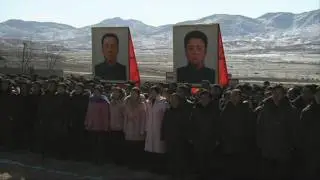North Korea unveils huge carving for late Kim