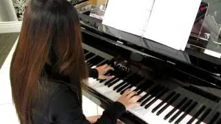 Carol Zhang and Amy Yu playing on two Fazioli Pianos at Aberdeen Centre