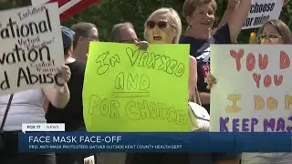 Opposing Face Mask Protesters Face Off