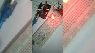 Arduino uno push button + a red led.  computer science hacks