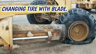 Replacing a Tire Using the Blade | Step-by-Step Grader Trick
