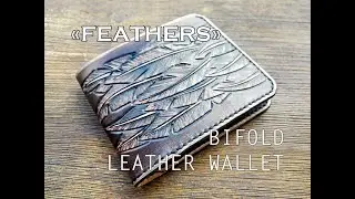 Hand-tooled and carved leather bifold wallet overview
