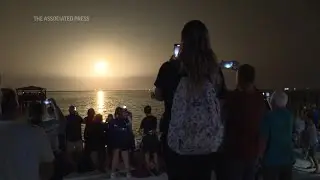 Spectators watch crewed launch to space station