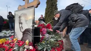 Foreign ambassadors lay flowers at Navalny's grave in Moscow on the anniversary of his death