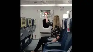 Opening wing exit emergency door of a plane #shorts #plane #open #wing #exit #emergency #door #135