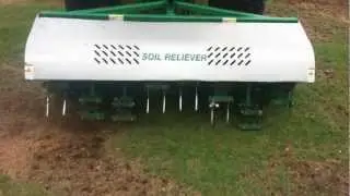 Verti-draining a football field