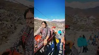The #woman is being carried up the #mountain in a #palanquin to the #Muktinath #Temple. #nepal
