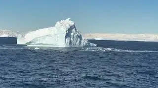 Cruising towards the south west end of Renaud Island, in the Biscoe Islands of Antarctica with Auror