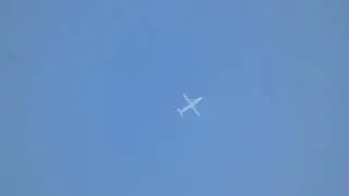 Berry Aviation Embraer EMB-120-RT cruising directly overhead at 28,000 ft in clear skies.