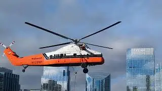 Sikorsky S-58 water tank lifts onto River North Chicago Westin rooftop. Video snippet