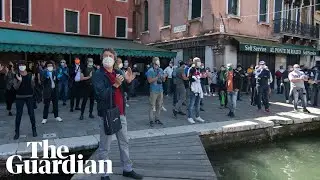 Italians dance and clap as toughest coronavirus lockdown measures lifted