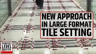 NEW APPROACH in large format tile installation with T-Lock&trade; tile lippage-free system