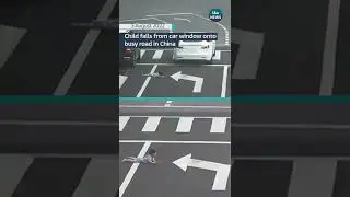 Child falls from car window onto busy road in China