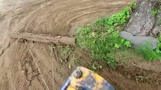 Leveling lawn with a railroad tie