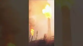 Lighting up a smoke stack with a torch #mildlyinteresting #fire