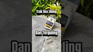 Nikung Sambil Oleng Truk Box ini Akhirnya Terguling