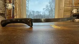 Hand forging a Damascus fish filet knife.