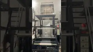 Rotary die head double winder blown film extruder