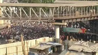 Scores of migrant labourers gather near Bandra Bus Depot