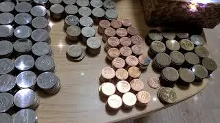 Sorting saved coins & forgotten loose change.